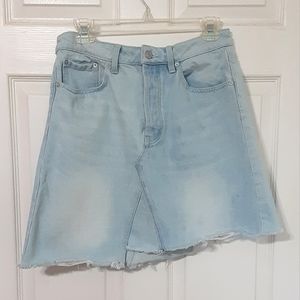 Free People We the Free distressed asymmetrical denim skirt.